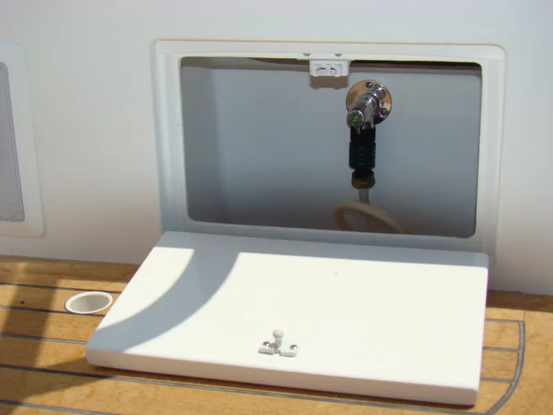 Slide: The Image of Access panel on the 2024 Jersey Cape 47 Custom Hardtop boat. - 24