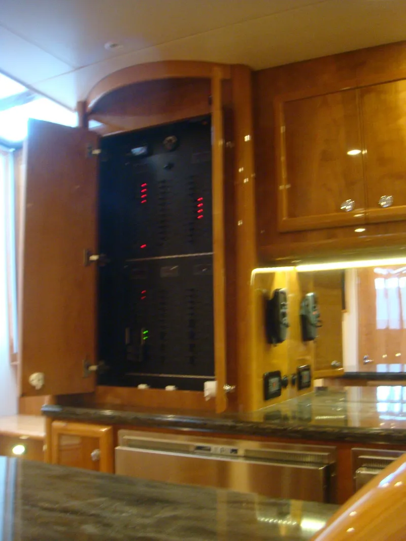 Slide: The Image of Electrical panel inside 2024 Jersey Cape 47 Custom Hardtop yacht. - 27