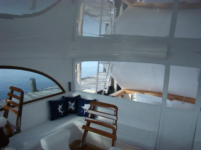 Slide: The Image of Interior of 2024 Jersey Cape 47 Custom Hardtop yacht with seating and nautical decor. - 41