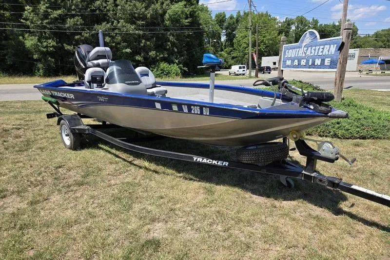 The Image of 2011 Tracker Pro Team 175 TF boat on trailer at Southeastern Marine dealership. - 0