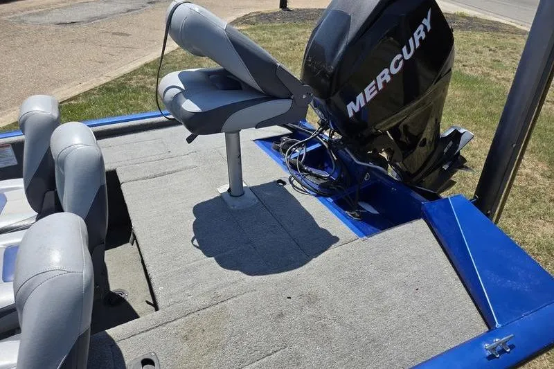 Slide: The Image of 2011 Tracker Pro Team 175 TF boat with Mercury motor and seating. - 5