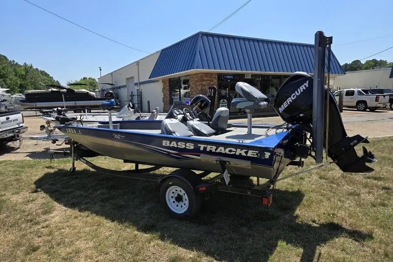 Slide: The Image of 2011 Tracker Pro Team 175 TF fishing boat with Mercury engine on trailer. - 14