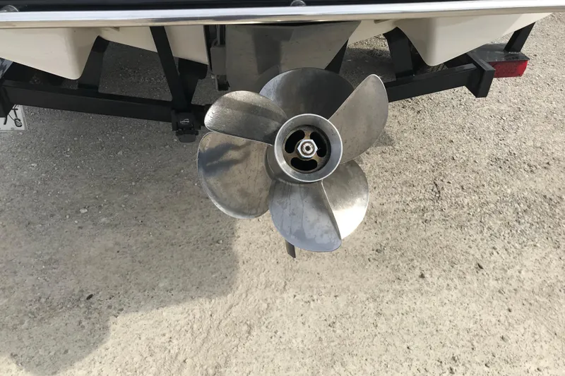Slide: The Image of Propeller of 2015 Four Winns H230 boat on a trailer. - 18