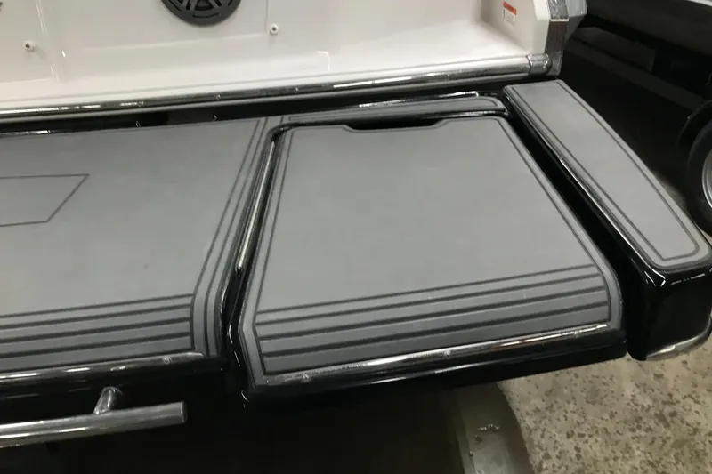 Slide: The Image of 2015 Four Winns H230 boat swim platform with gray non-slip surface. - 21