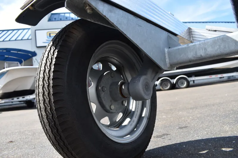 Slide: The Image of Triton PWC Trailers EWCI One Place Torsion axle 2025 - 2