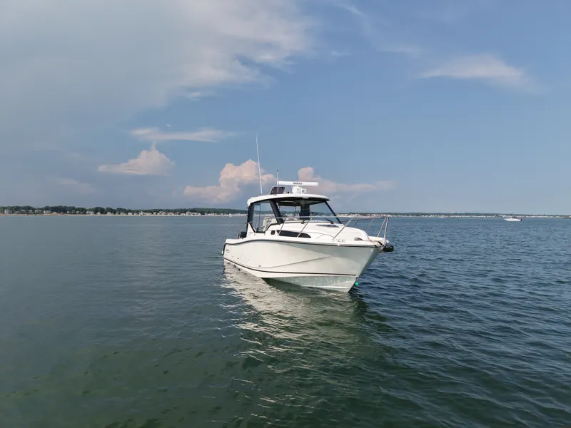 Slide: The Image of Boston Whaler 325 Conquest 2026 - 2