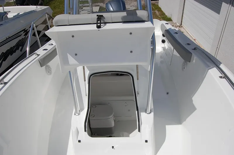 Slide: The Image of 2025 Cape Horn 22 OS boat interior with open storage compartment. - 10