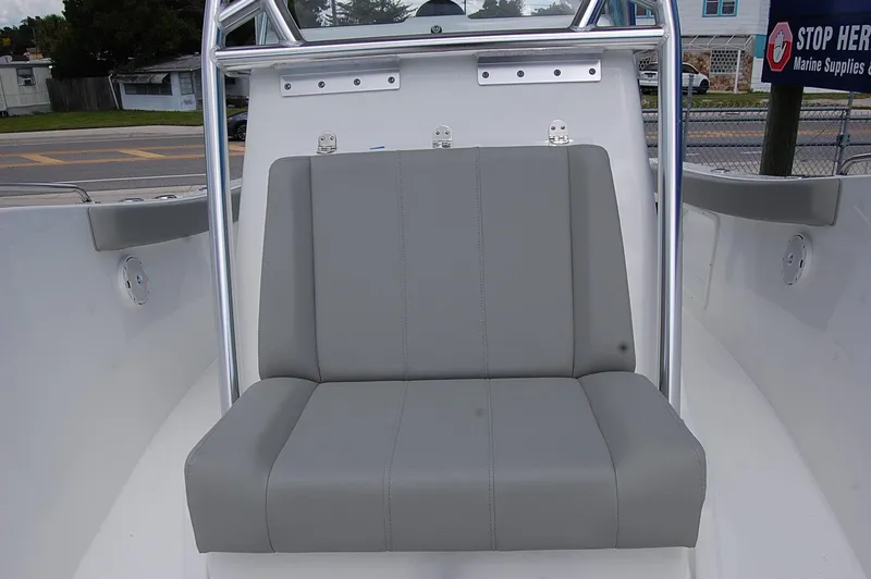 Slide: The Image of 2025 Cape Horn 22 OS boat with gray cushioned seating. - 11