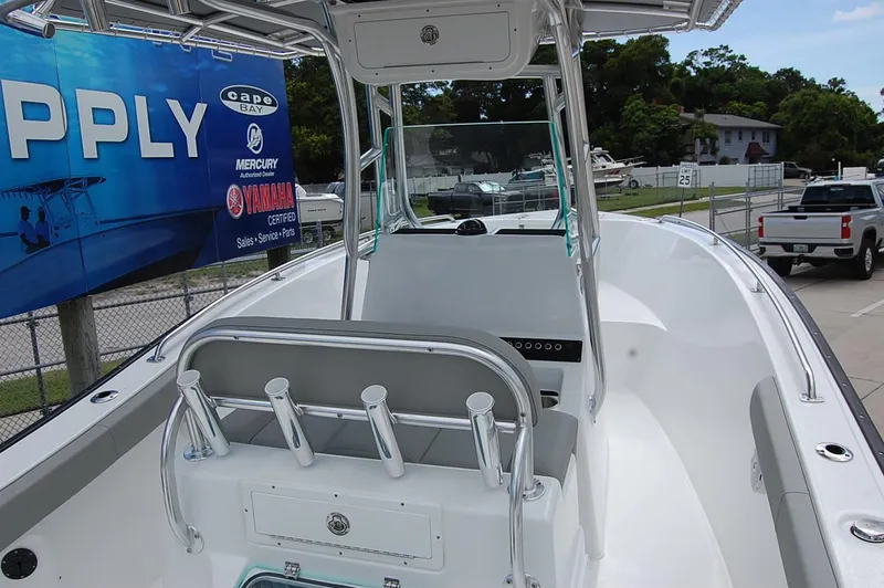 Slide: The Image of 2025 Cape Horn 22 OS boat interior with helm station and seating. - 4