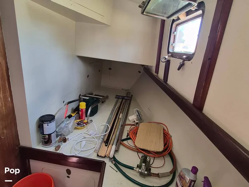 Slide: The Image of Port Side Aft Bunk. Coushions In Storage. - 16736610