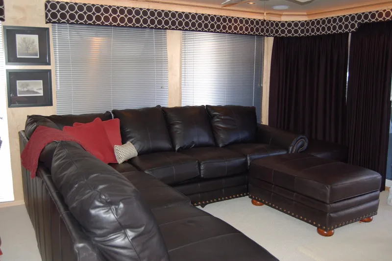 Slide: The Image of Luxurious leather seating area in 2006 Sumerset Seas The Day Share 7 houseboat. - 16