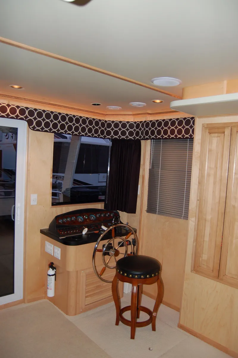 Slide: The Image of 2006 Sumerset Seas The Day Share 7 houseboat interior helm station. - 19