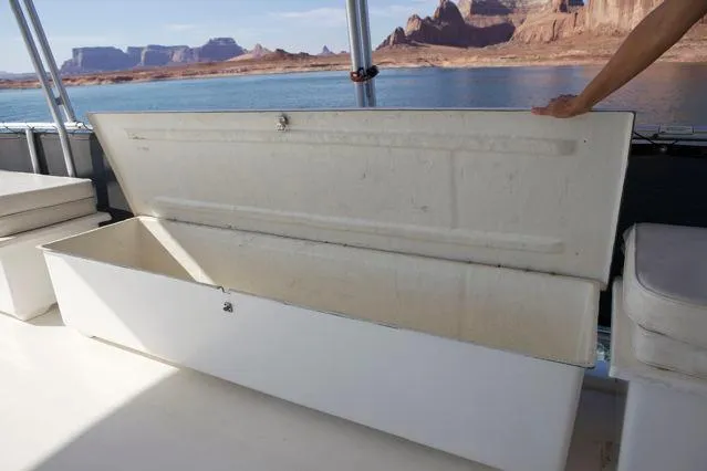 Slide: The Image of Open storage compartment on 2006 Sumerset Seas The Day Share 7 houseboat with scenic lake view. - 4