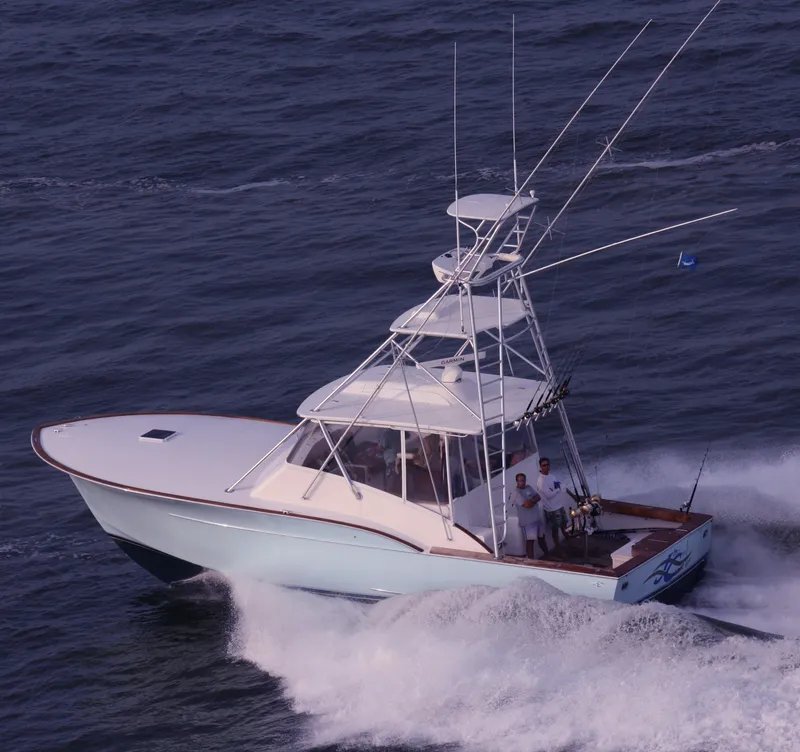 Slide: The Image of 2024 Jersey Cape Devil 45-Express Custom boat cruising on the ocean. - 0