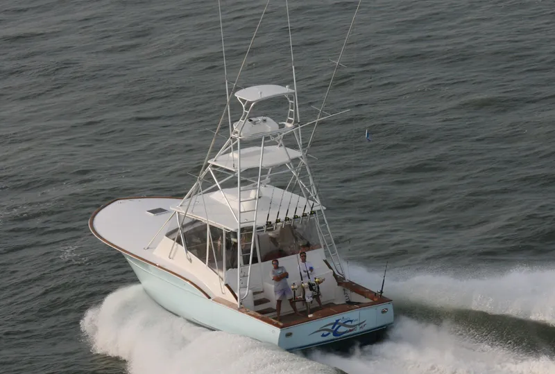Slide: The Image of 2024 Jersey Cape Devil 45-Express Custom boat cruising on the water. - 11