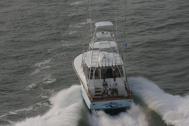 Slide: The Image of 2024 Jersey Cape Devil 45-Express Custom boat cruising on the water. - 12