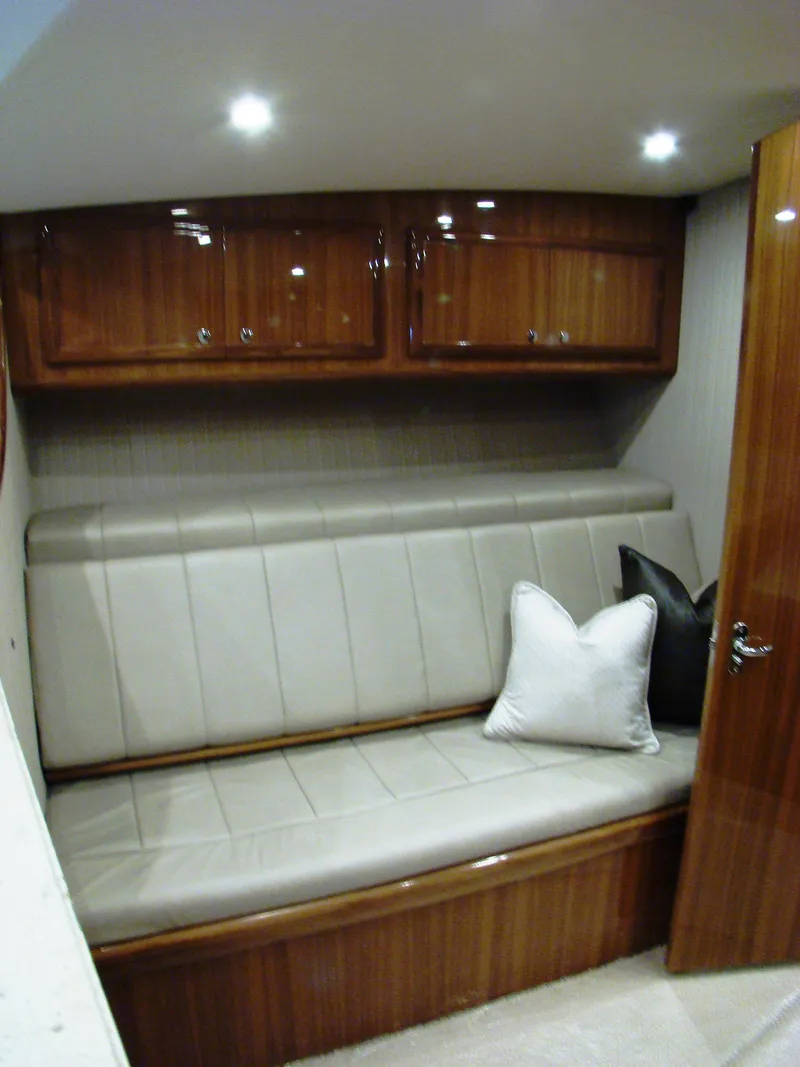 Slide: The Image of 2024 Jersey Cape Devil 45-Express Custom interior cabin with seating and storage - 20