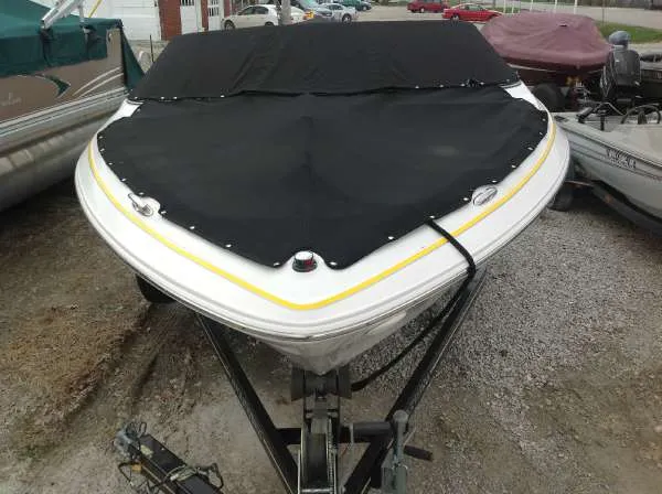 Slide: The Image of 2005 Four Winns 190 Horizon boat with black cover on trailer. - 3