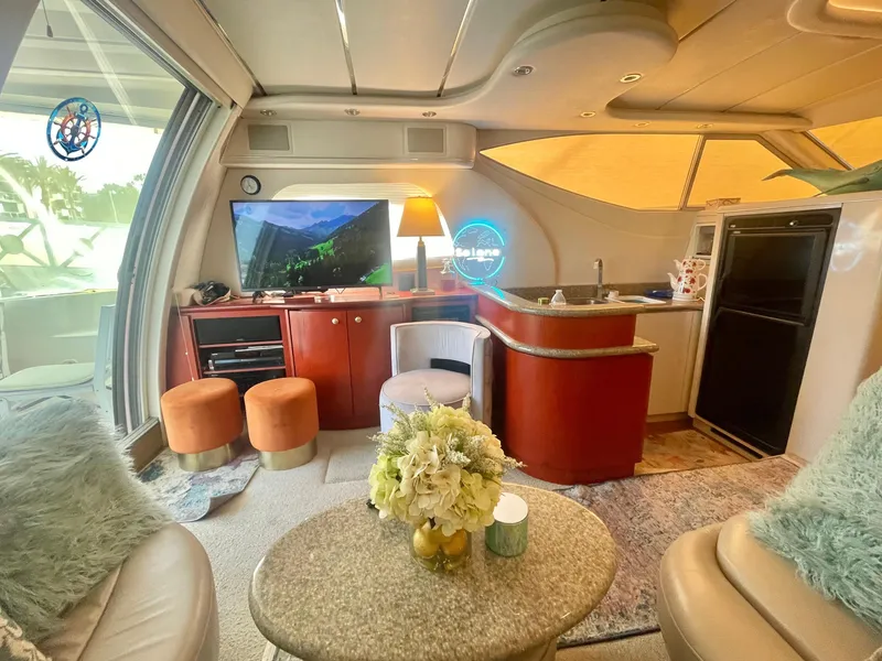 Slide: The Image of Luxurious interior of a 1998 Maxum 4100 SCA yacht with modern amenities and elegant decor. - 21