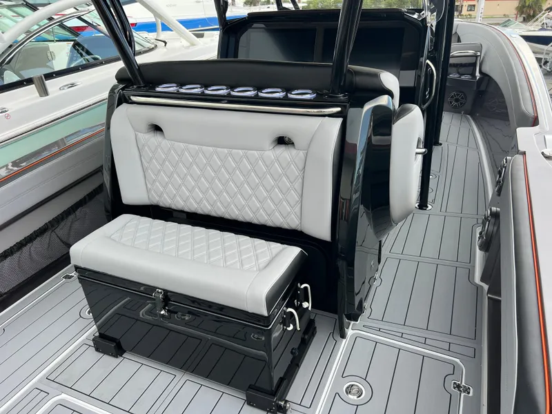 Slide: The Image of 2026 Nor-Tech 340 Sport boat interior with sleek seating and modern design. - 10