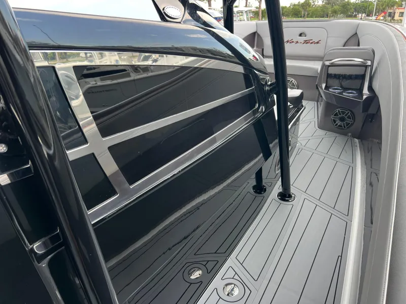 Slide: The Image of 2026 Nor-Tech 340 Sport boat interior with sleek design and modern features. - 15