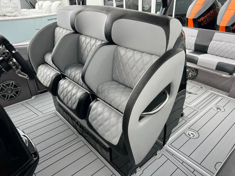 Slide: The Image of Luxurious seating on 2026 Nor-Tech 340 Sport boat with quilted upholstery and modern design. - 20