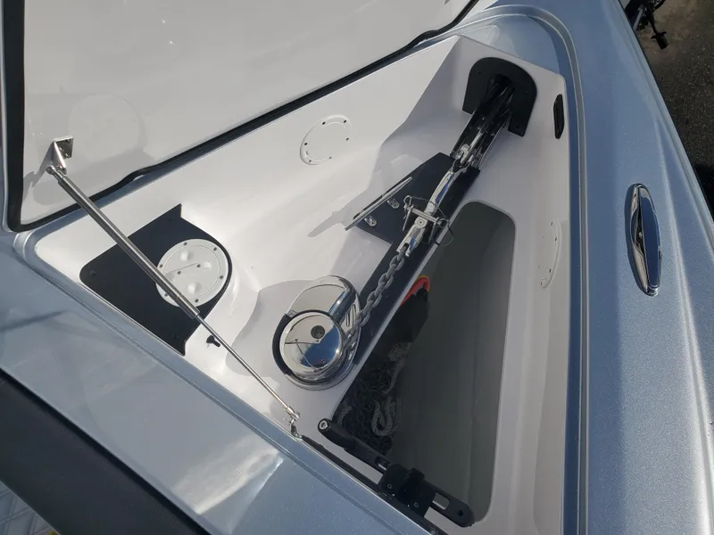 Slide: The Image of 2024 Nor-Tech 340 Sport boat storage compartment with hydraulic lift. - 28