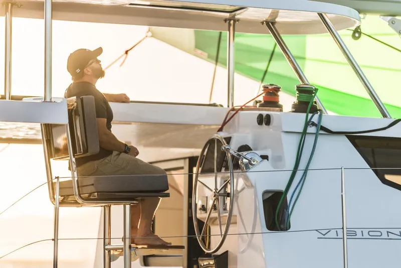 Slide: The Image of Man relaxing on Vision 444 yacht, 2025 model, enjoying the sunset. - 15