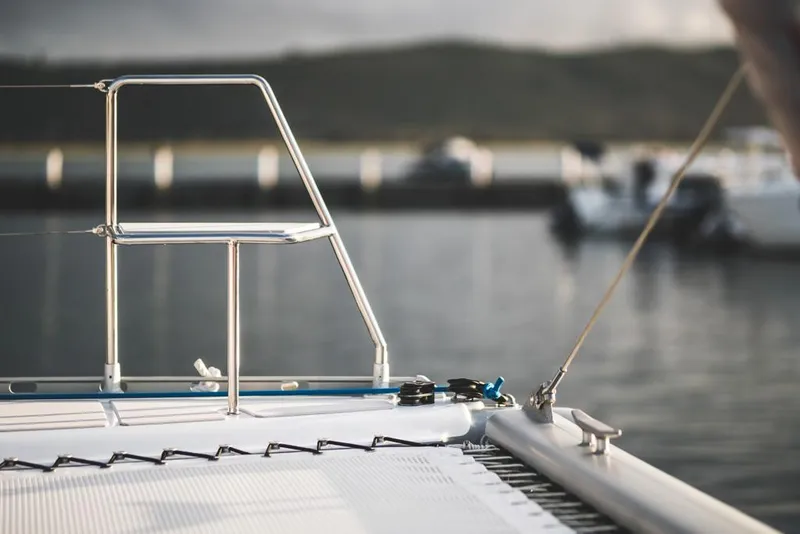 Slide: The Image of Sailboat deck with railing, Vision 444 model, 2025, docked at marina. - 25