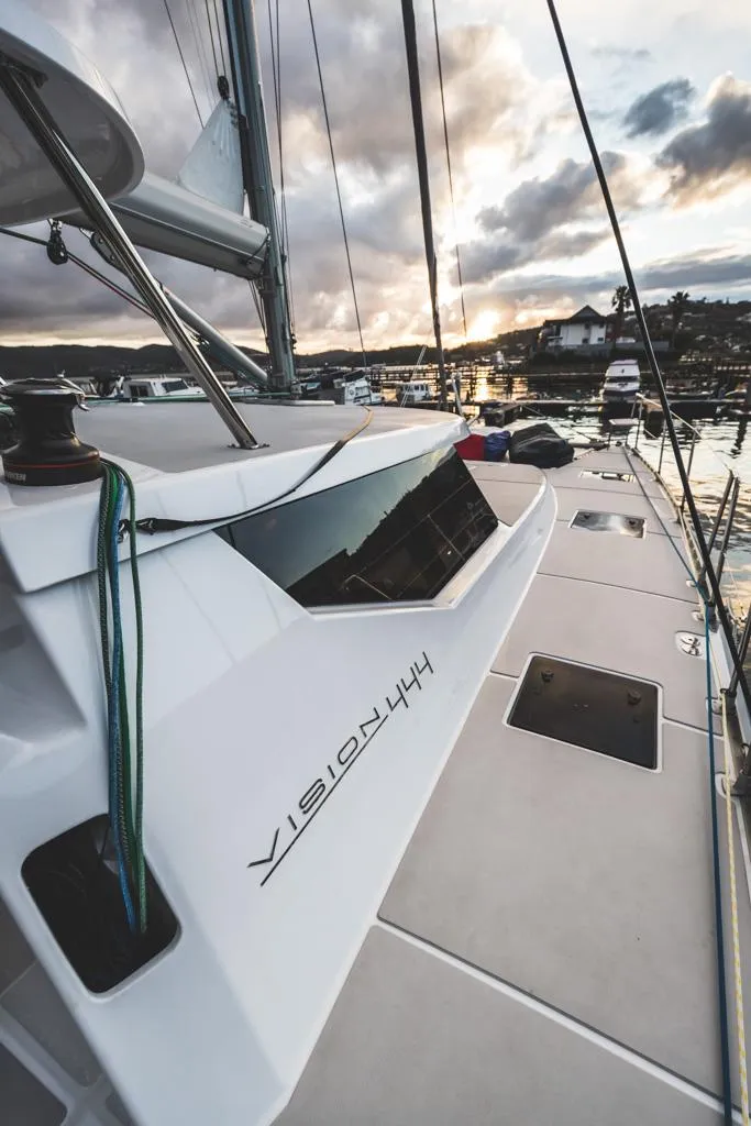 Slide: The Image of Sleek Vision 444 sailboat docked at sunset, 2025 model. - 26