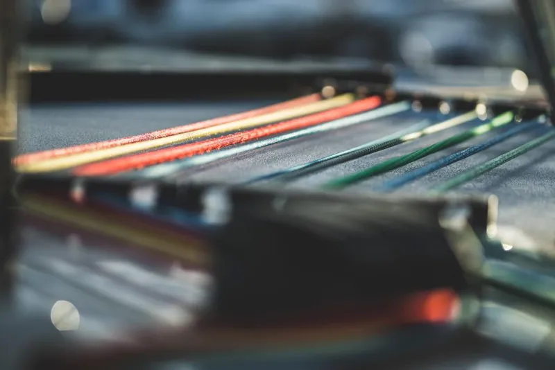 Slide: The Image of Close-up of colorful strings on Vision 444 model, 2025. - 31