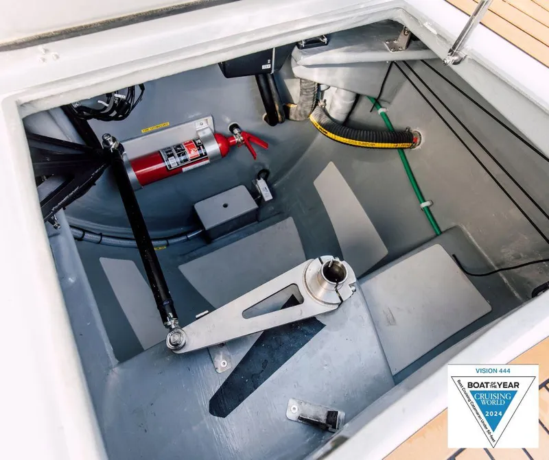 Slide: The Image of Vision 444 boat interior, 2025 model, featuring a fire extinguisher and mechanical components. - 38