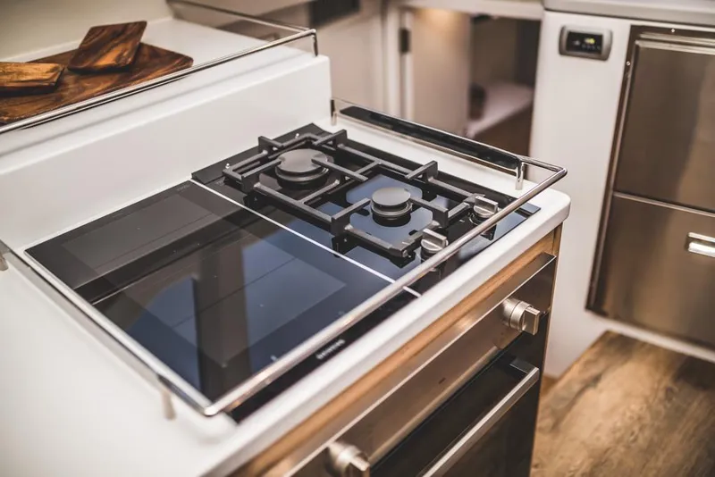 Slide: The Image of Modern kitchen stove with dual burners, Vision 444 model, 2025 design. - 45