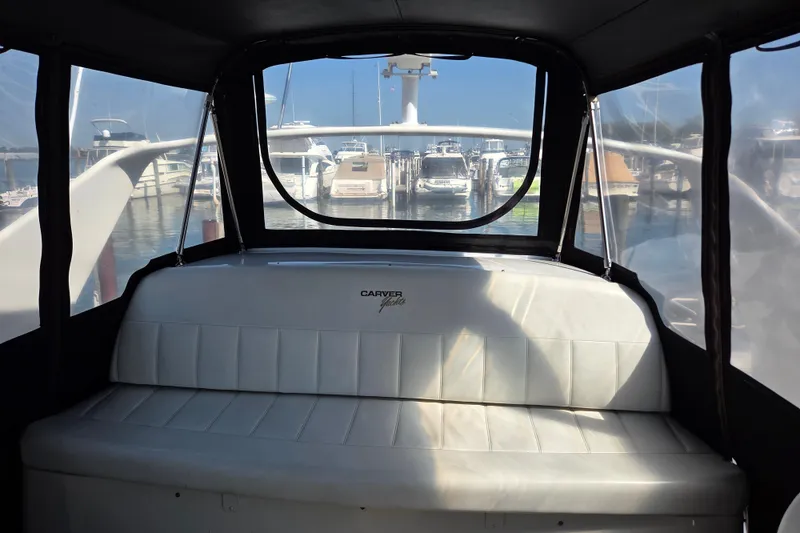 Slide: The Image of Interior view of 1997 Carver 350 Mariner yacht with marina backdrop. - 20