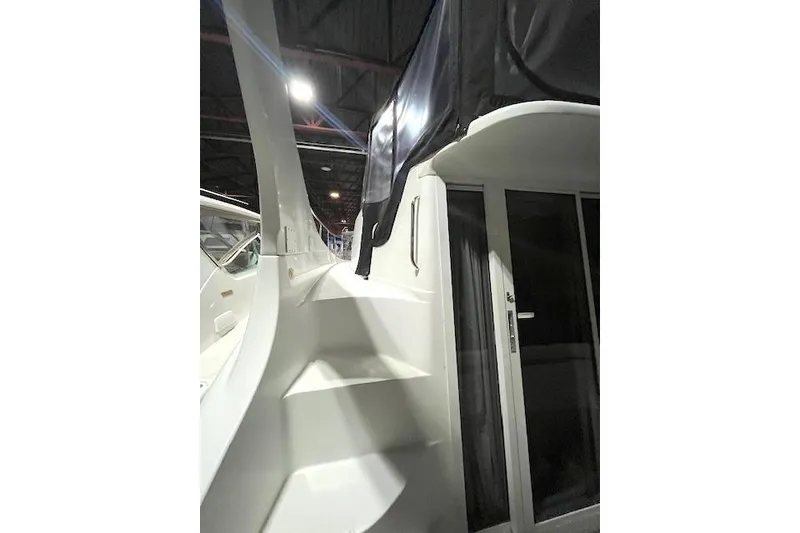 Slide: The Image of 1997 Carver 350 Mariner yacht interior with stairs and sliding door. - 25