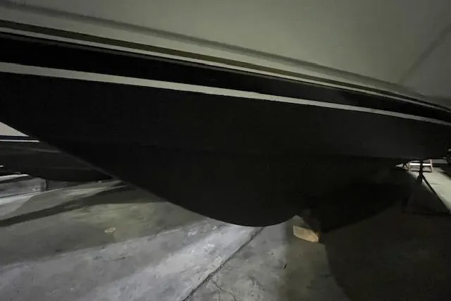 Slide: The Image of 1997 Carver 350 Mariner boat hull in storage, side view. - 41