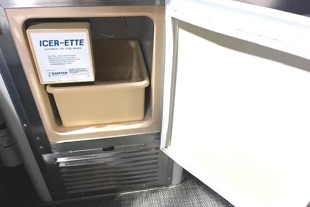 Slide: The Image of 1997 Carver 350 Mariner ice maker, open door, beige interior, Icer-Ette model. - 13
