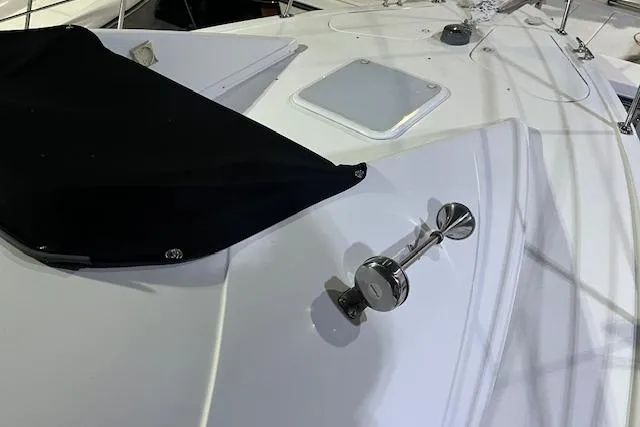 Slide: The Image of 1997 Carver 350 Mariner yacht deck with hatch and chrome fittings. - 24