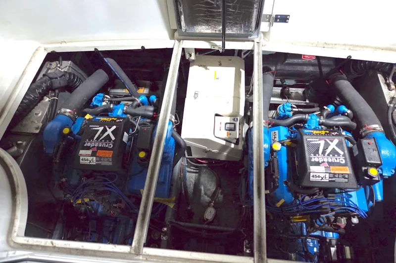 Slide: The Image of 1997 Carver 350 Mariner engine compartment with twin Crusader 454XL engines. - 45