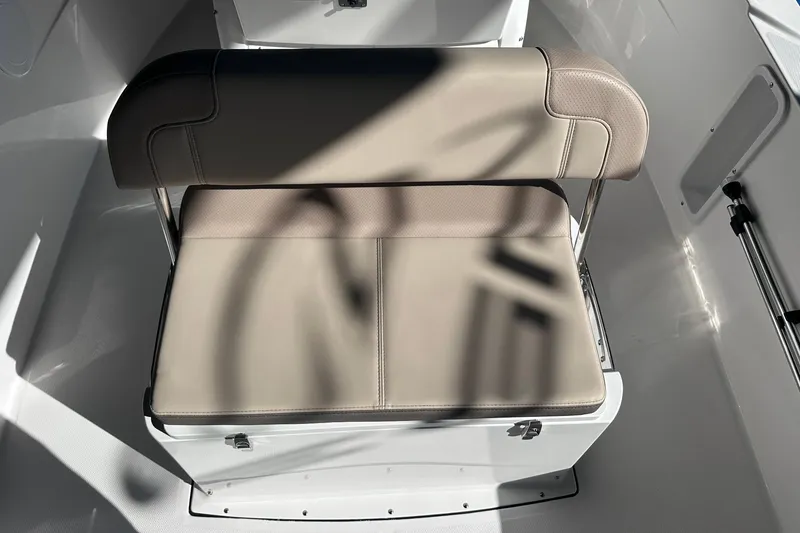 Slide: The Image of Edgewater 170CC 2026 boat seat with beige upholstery and sleek design. - 14
