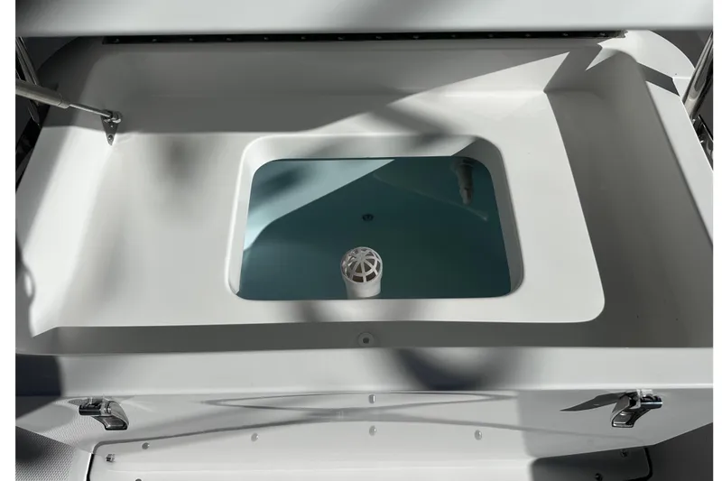 Slide: The Image of Livewell compartment in 2026 Edgewater 170CC boat, featuring sleek design and functionality. - 15
