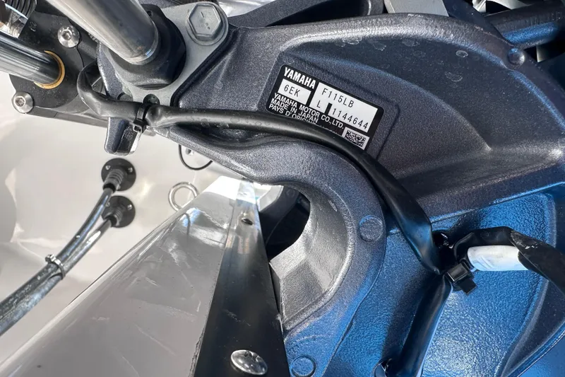 Slide: The Image of Close-up of Yamaha motor on 2026 Edgewater 170CC boat, showing model and serial number. - 29