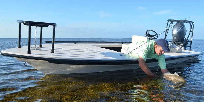 The Image of 2024 Maverick 17 HPX-S boat in shallow water with a man fishing. - 1