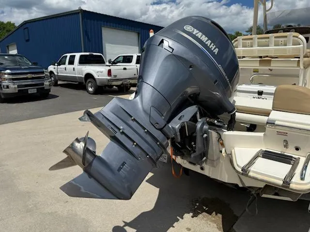 Slide: The Image of 2016 Pioneer 197 Islander boat with Yamaha outboard motor in a parking lot. - 4