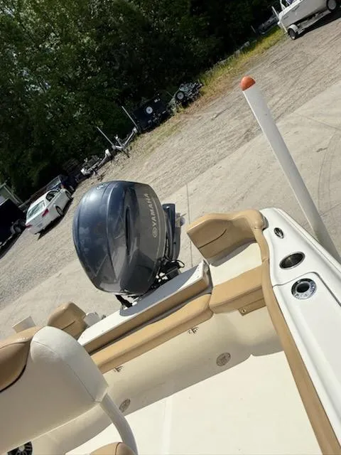 Slide: The Image of 2016 Pioneer 197 Islander boat with Yamaha outboard motor in a parking area. - 5