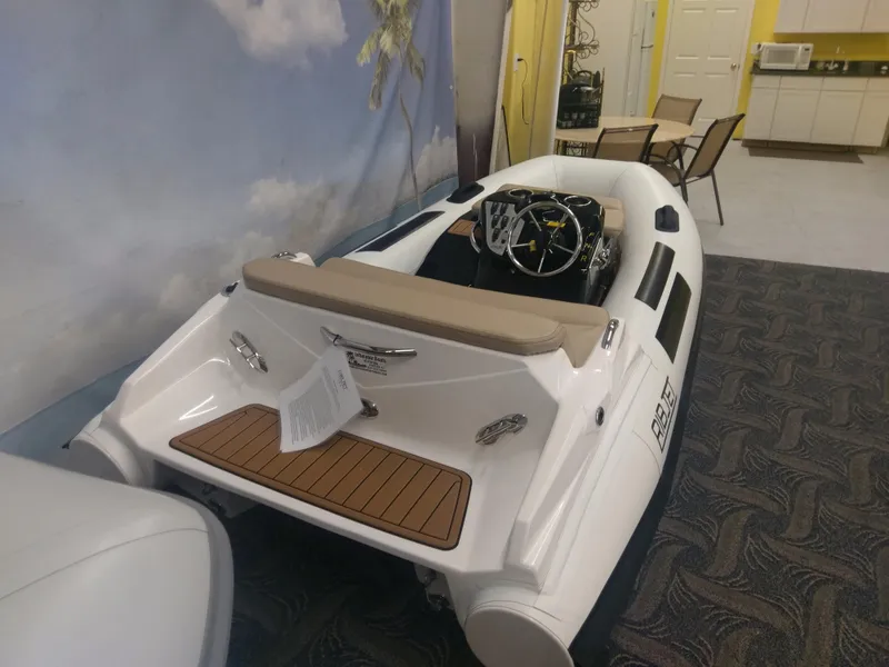 Slide: The Image of 2023 Ribjet 10 inflatable boat on display indoors. - 6