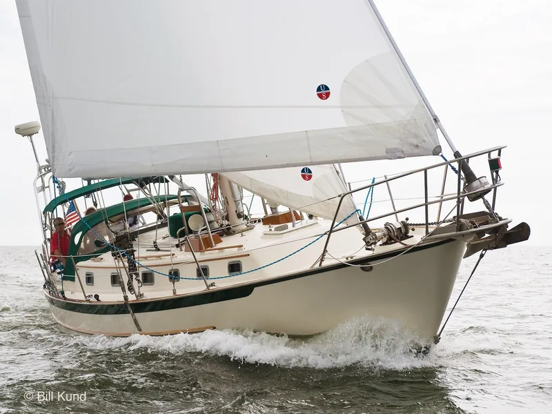 Slide: The Image of Sailing yacht Pacific Seacraft 40, 2025 model, cruising on open water. - 7