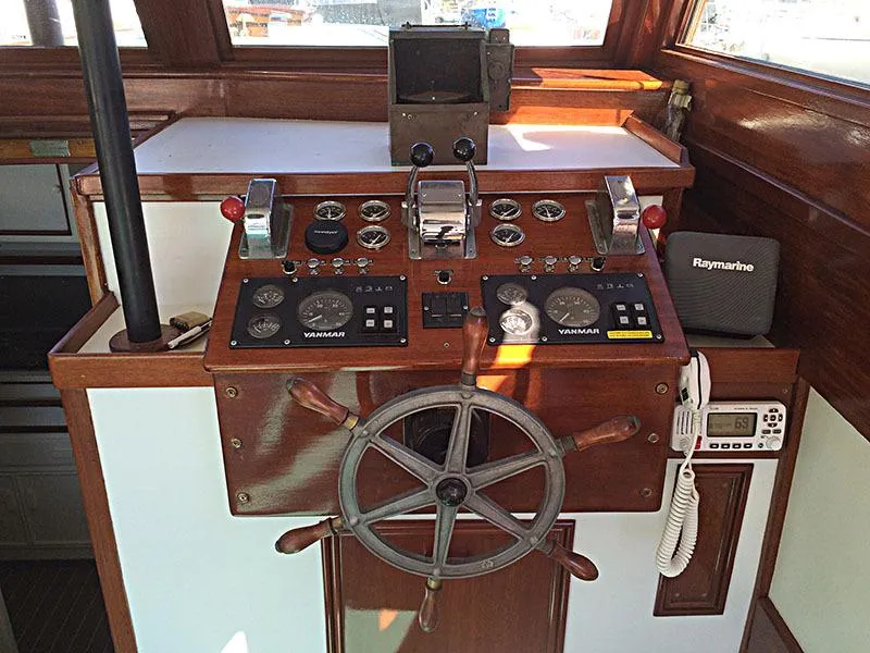 Slide: The Image of 1934 Classic Cruiser Hemingway's Pilar Replica helm with vintage controls and wooden steering wheel. - 17