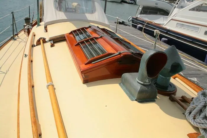 Slide: The Image of 1958 Concordia Yawl deck with wooden details and ventilation system. - 14