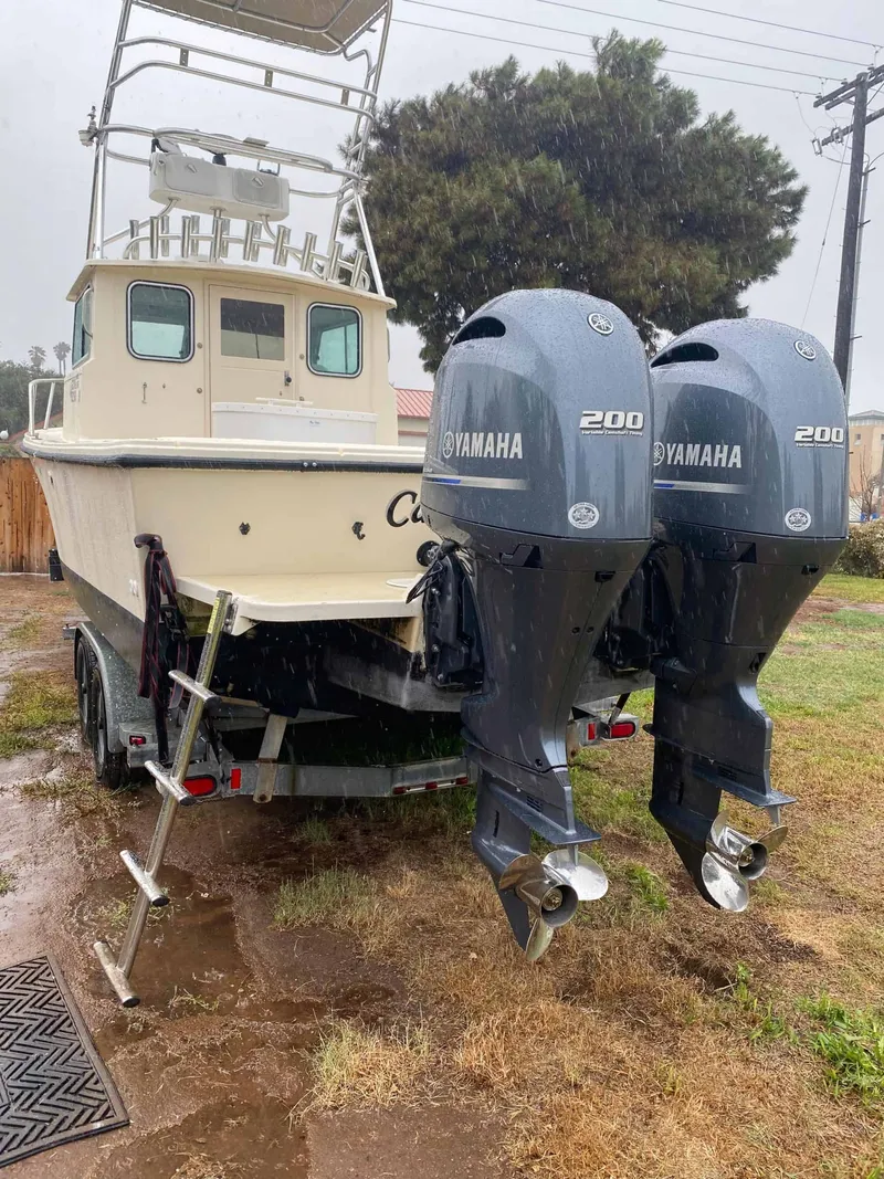 Slide: The Image of Parker Marine 2520 Deep Vee Sport Cabin 2004 - 8